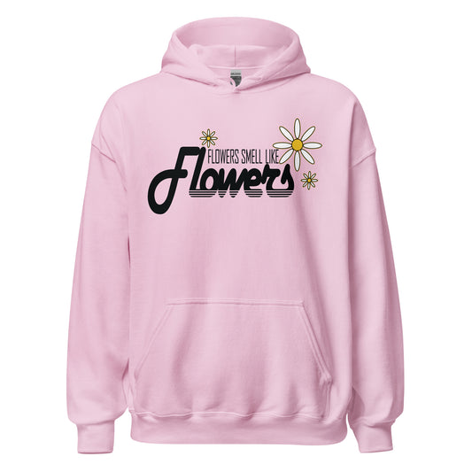 Retro-style black text with yellow-centered flower graphic on pastel pink hoodie
